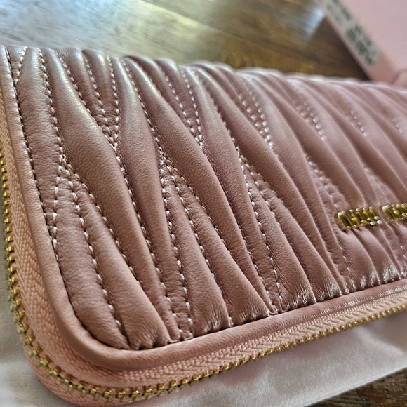 Miu Miu Handbags - Pink Miu Miu Matelassé Nappa Leather Wallet